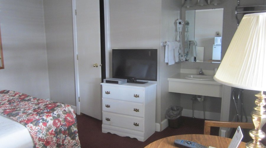 Single Queen room includes a small shower