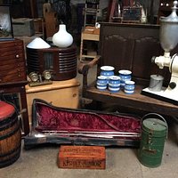 Some of our quirkier stock including a coffee grinder, a radio and a trombone!