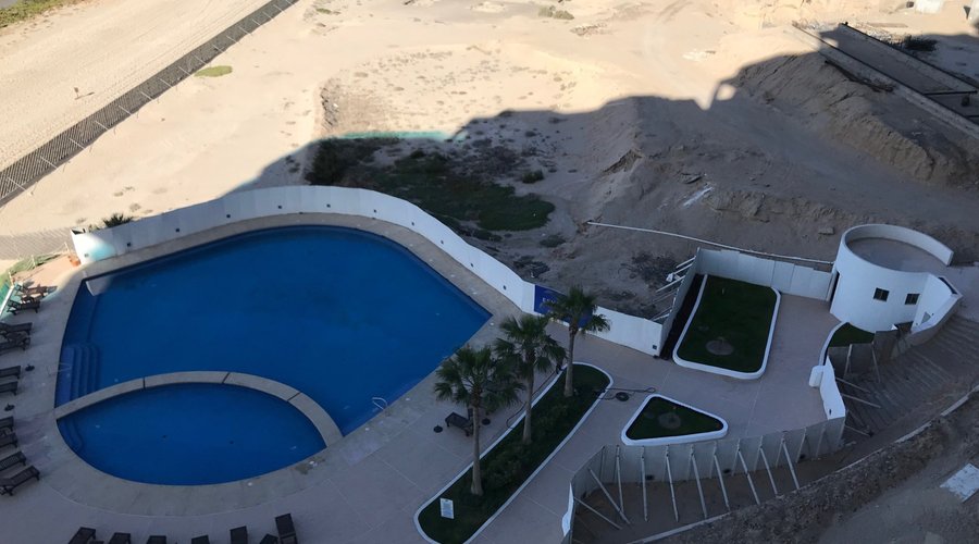 Partially constructed pool. Not heated. No bar.