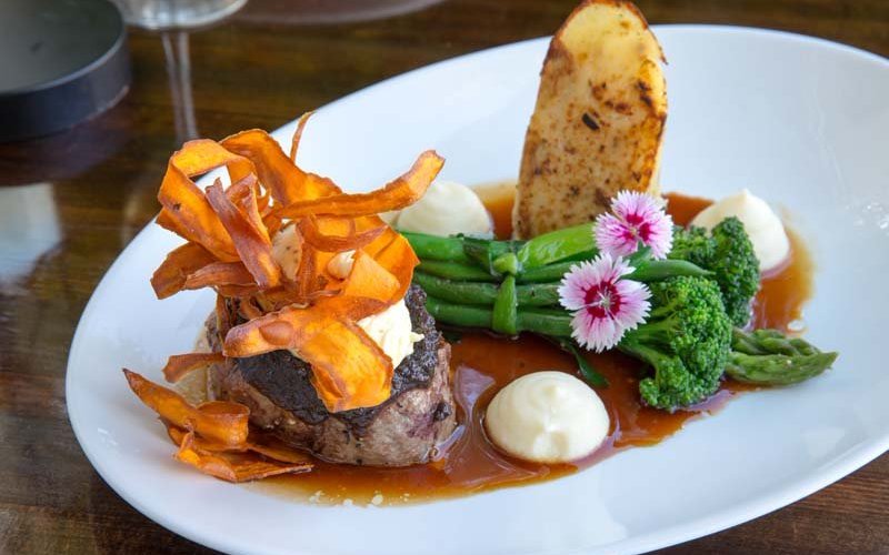 Eye Fillet: with mushroom duxelle, parsnip puree, chat potato cake, mustard creme fraiche & gree