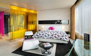 W Bangkok in Bangkok, image may contain: Furniture, Book, Bedroom, Bed