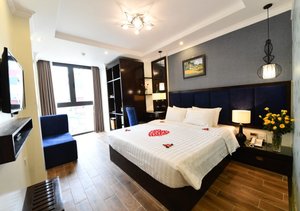 Hanoi Bella Rosa Trendy Hotel in Hanoi, image may contain: Monitor, Screen, Home Decor, Furniture