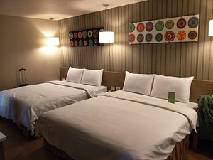 Kindness Hotel Kaohsiung Jue Ming in Sanmin, image may contain: Interior Design, Dorm Room, Bed, Furniture