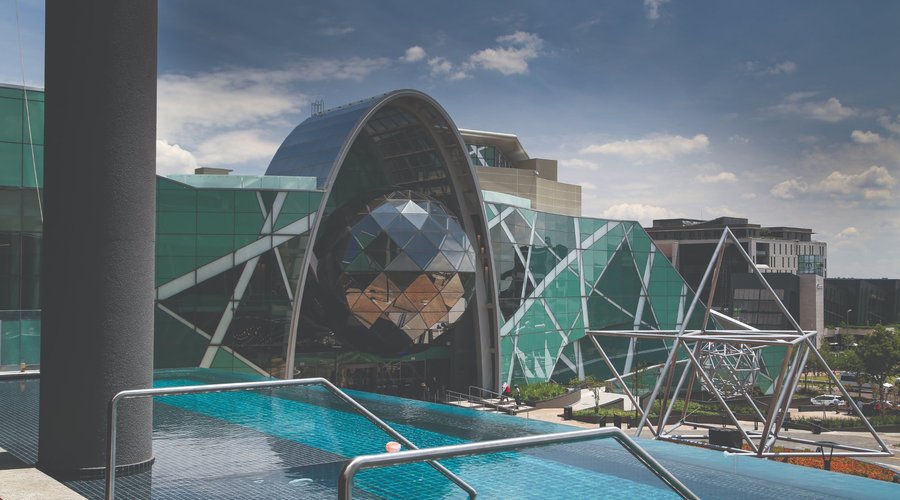 The hotel pool deck with a bar that is open to all hotel residents that are booked into the hotel.