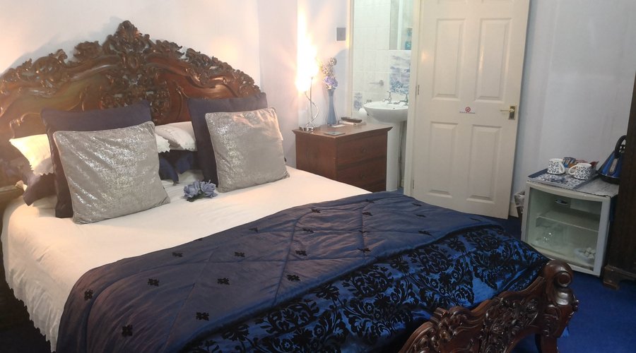 The Blue Room - Super-king size bed with en-suite. All rooms have mini fridges & Tea/ Coffee tra