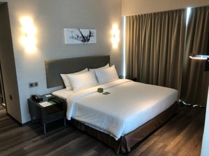 Olive Tree Hotel in Penang Island, image may contain: Bed, Furniture, Bedroom, Room