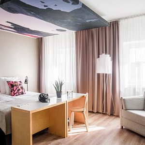 Hotel Helka in Helsinki, image may contain: Home Decor, Interior Design, Table, Cushion