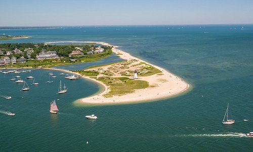 Aerial photo of Edgartown Harbor with Harbor View Hotel and Lighthouse 
