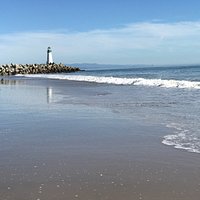 Walton Lighthouse reflected in Sand.