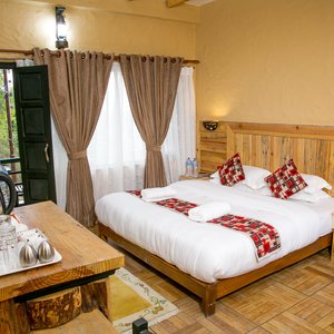 Tourist Residency in Pokhara, image may contain: Hotel, Interior Design, Furniture, Wood