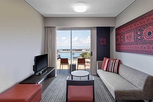 Adina Apartment Hotel Darwin Waterfront in Darwin, image may contain: Couch, Living Room, Penthouse, Monitor
