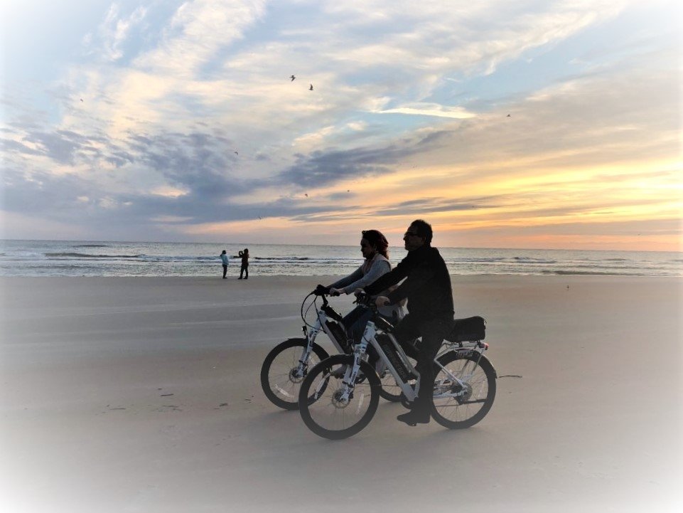 Riding a bike discount on the beach