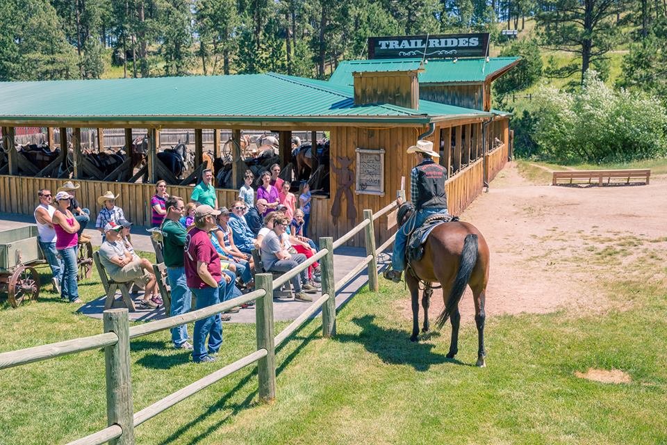 the stables at palmer gulch        
        <figure class=