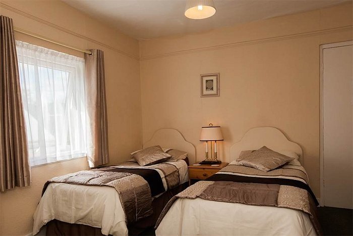 A twin bedded en-suite room.