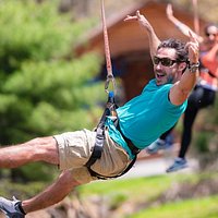 Zip over the river and through the woods at Camelback Mountain Adventures