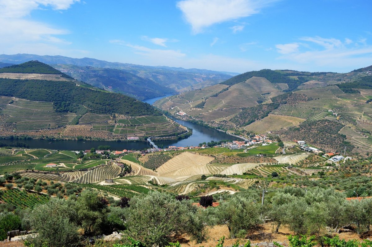 Couple enjoying hillside view, Chas de Egua, Portugal - Stock