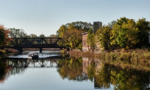 Learn about the historic city of Woonsocket, its architecture, and numerous bridges