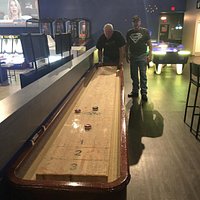 playing shuffleboard