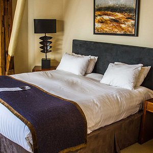 Double beds wrapped in luxury cotton sheets and a feather duvet, also features an en-suite bathr