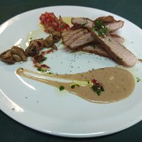 secret iberic amb oli de pernil i cremos de mostaza i xampinyons