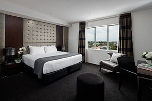 Rydges Latimer Christchurch in Christchurch, image may contain: Furniture, Bedroom, Interior Design, Home Decor