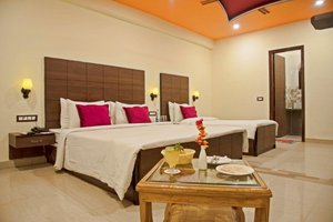 Spring Sky Mughalsarai By ShriGo Hotels in Mughal Sarai, image may contain: Interior Design, Home Decor, Resort, Hotel