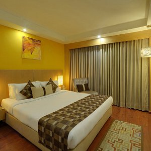 Siamton Inn in Kolkata (Calcutta), image may contain: Interior Design, Screen, Monitor, Bed