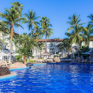 Plaza Pelicanos Club Beach Resort in Puerto Vallarta, image may contain: Summer, Hotel, Pool, Outdoors