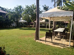 Green Meadows Resort in Chennai (Madras), image may contain: Resort, Hotel, Grass, Backyard