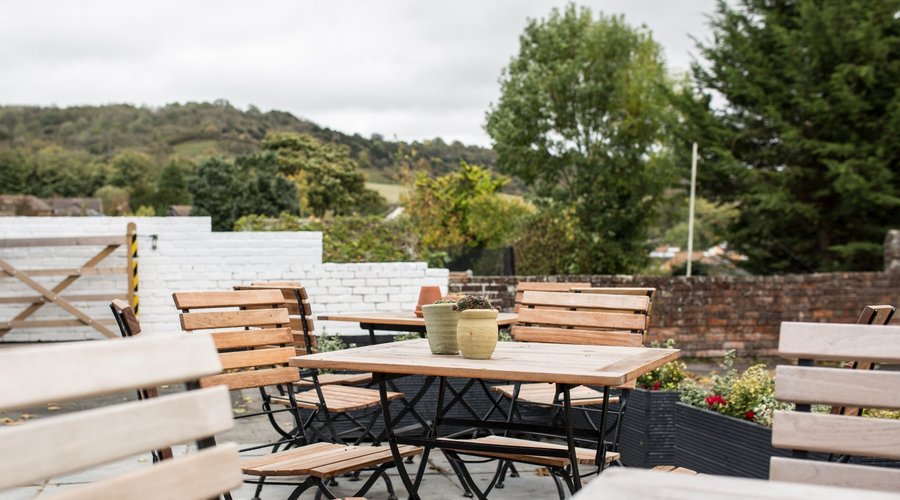 Ouside rear patio area - 8 tables to enjoy the sunshine & views