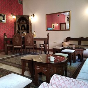 Isa Begov Hamam Hotel in Sarajevo, image may contain: Home Decor, Living Room, Cup, Chair