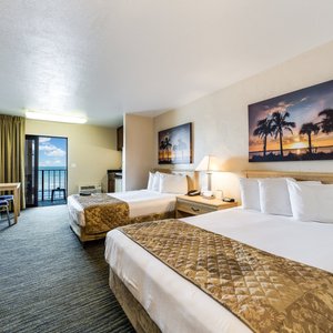 Beachside Hotel in Daytona Beach, image may contain: Monitor, Screen, Computer Hardware, Bed