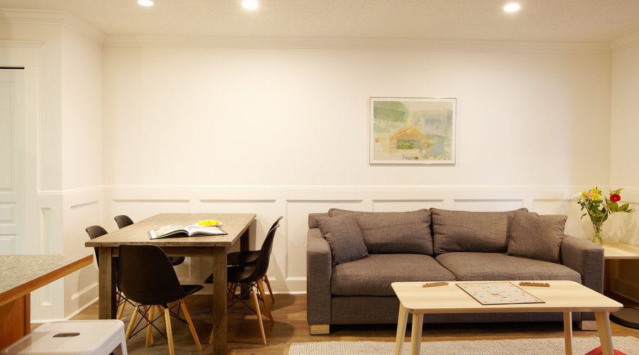 Terrace Three, living room that overlooks the towering trees and ocean beyond.