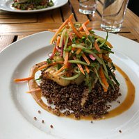Signature sea bass with a slaw and on top of quinoa
