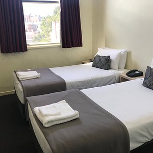 Miami Hotel Melbourne in Melbourne, image may contain: Dorm Room, Bed, Furniture, Hostel