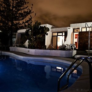 Exterior de bungalow con vista a zona de piscina