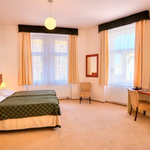 Hotel Victoria in Prague, image may contain: Dorm Room, Furniture, Lighting, Hotel