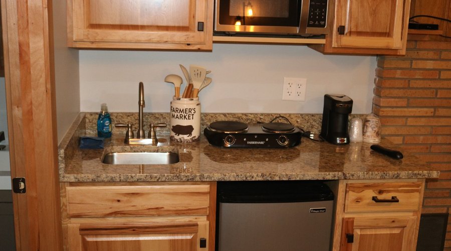 Fireplace Suite - King bed, kitchenette, gas fireplace, private enclosed porch, large flatscreen