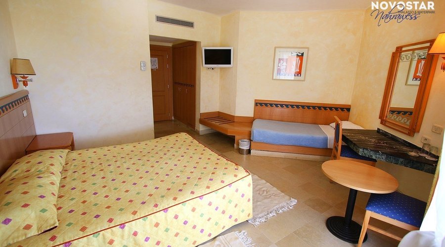 Отель Novostar Nahrawess. Номер категории TRPL. 