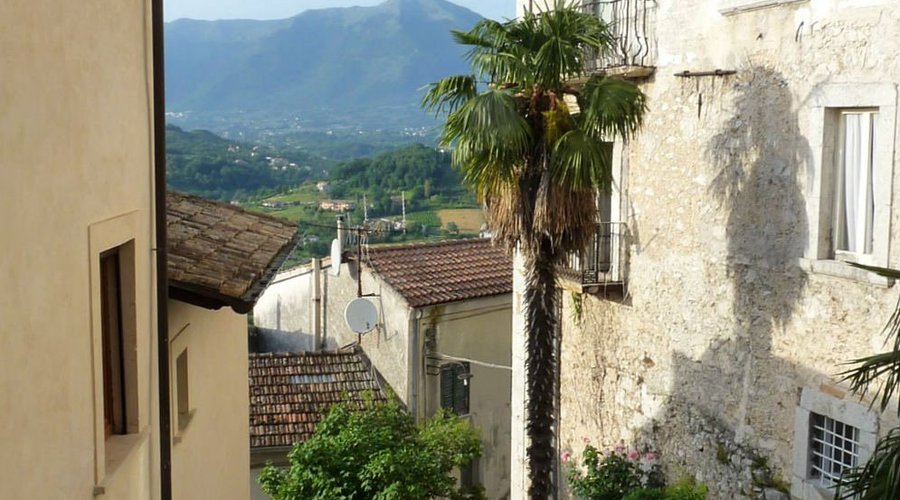 View from my window of the courtyard garden and the Val Di Comino beyond