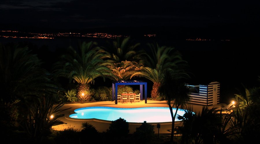 The pool with the Sao Jorge light's in the background.