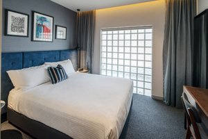 Mrs Banks Hotel in Sydney, image may contain: Bed, Furniture, Bedroom, Home Decor