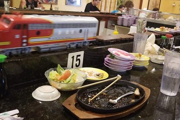 https://dynamic-media-cdn.tripadvisor.com/media/photo-o/13/55/58/0c/sakura-ii-sushi-train.jpg?w=600&h=400&s=1