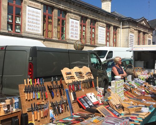 Fruit Stall With People Buying At Morlaix Weekly Market France