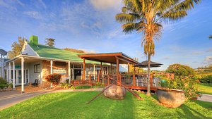Castaway Norfolk Island in Norfolk Island, image may contain: Hotel, Resort, Villa, Grass