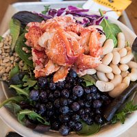 Get your greens in with our Wild Blue, topped with lobster meat or your fave seafood!