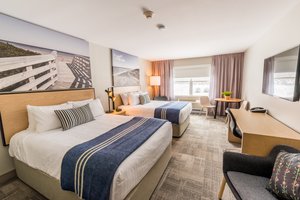 Mill River Resort in Saint Anthony, image may contain: Dorm Room, Furniture, Bed, Bedroom