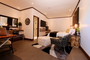 The Bourke Hotel in Mindanao, image may contain: Home Decor, Screen, Monitor, Living Room