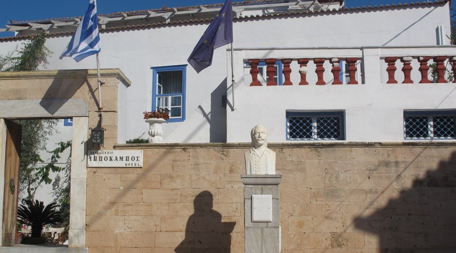 Hotel behind entrance wall