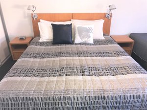 Culburra Beach Motel in Culburra Beach, image may contain: Furniture, Bed, Cushion, Home Decor